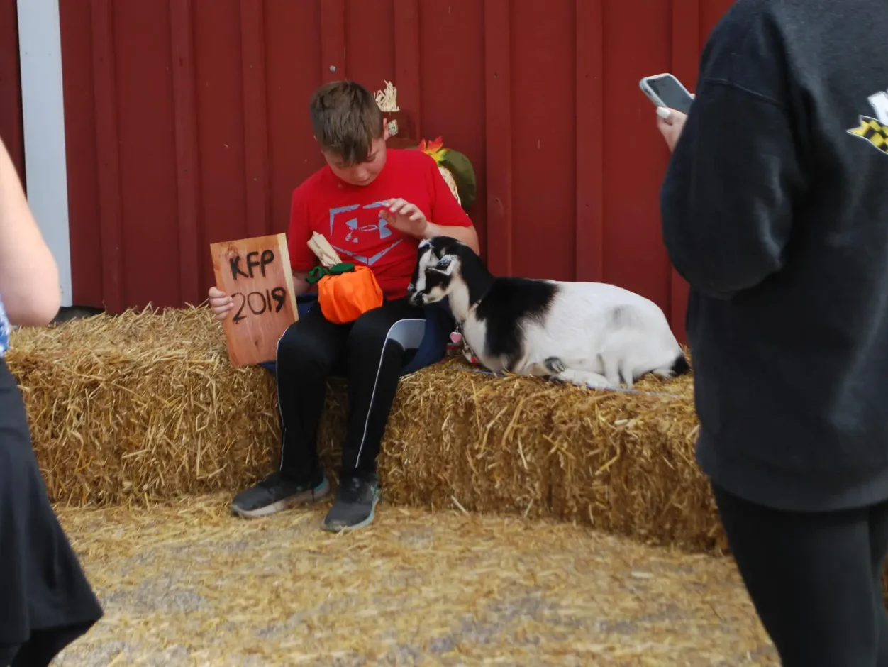 boy with a goat